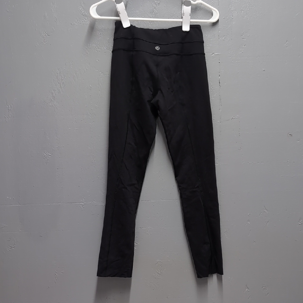 Lululemon Black Legging Size 2 Cut/Raw Hem On Legs. Crop.